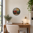 Mosaic medallion wall art with round patchwork design in dark, red, gold, and green tones