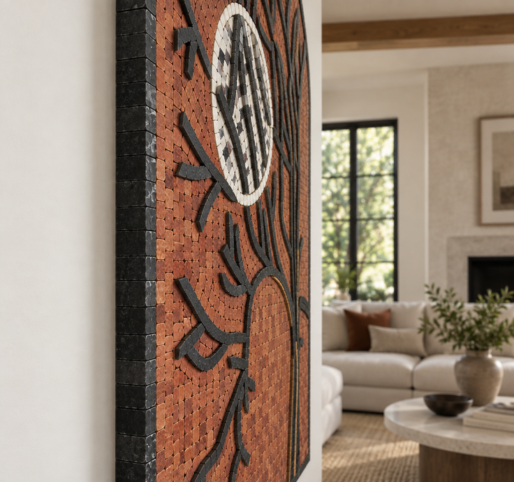 Stone mosaic wall art with orange arch, black branches, and a white moon circle